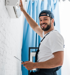 smiling workman looking at camera while repairing 2021 09 21 23 34 35 utc 1