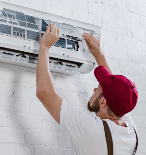 young repairman changing filter for air conditione 2021 08 29 22 36 22 utc